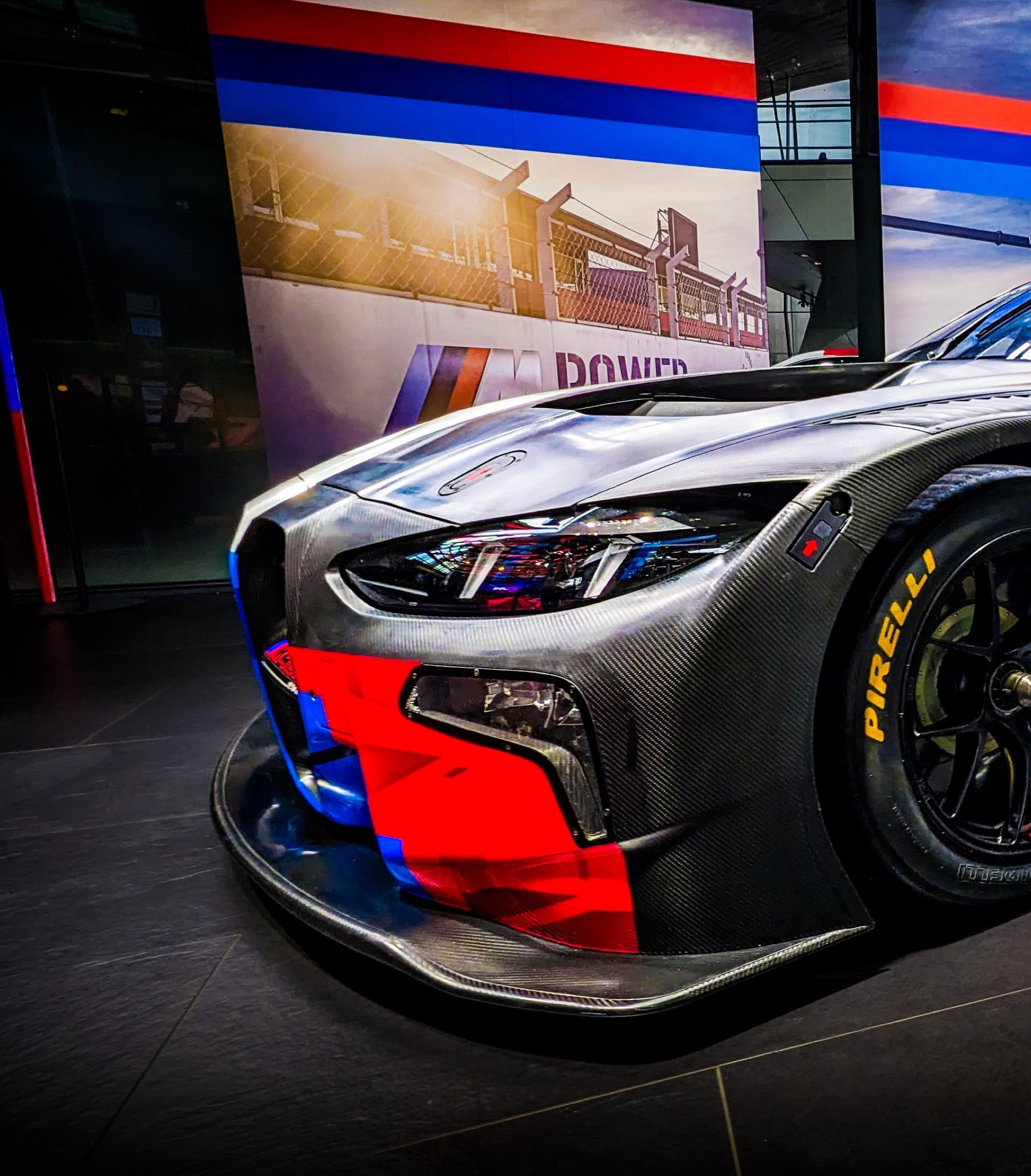 BMW M4 GT3 — front-half close, carbon splitter and tire